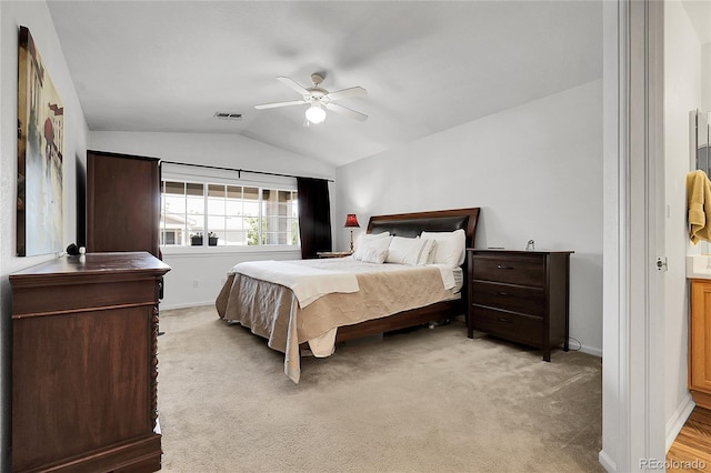 4251 S Blackhawk Cir Unit 3E, Aurora, CO 80014 - bedroom with vaulted ceiling, light colored carpet, and ceiling fan