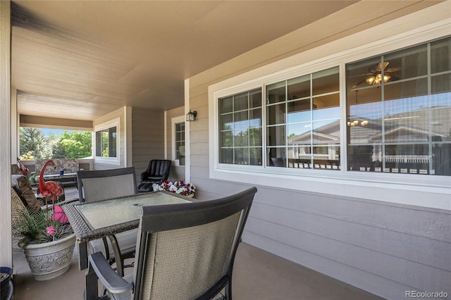 4251 S Blackhawk Cir Unit 3E, Aurora, CO 80014 - porch with outdoor dining space