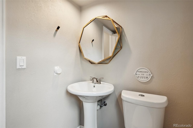 7035 S Flower Ct, Littleton, CO 80128 - half bathroom with toilet