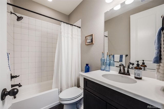 bathroom featuring toilet, a textured wall, shower / bath combo with shower curtain, and vanity