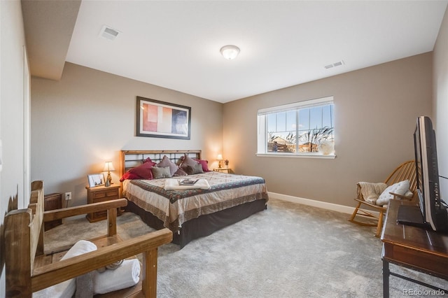 bedroom featuring carpet flooring, visible vents, and baseboards