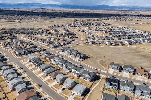 birds eye view of property featuring a residential view and a mountain view