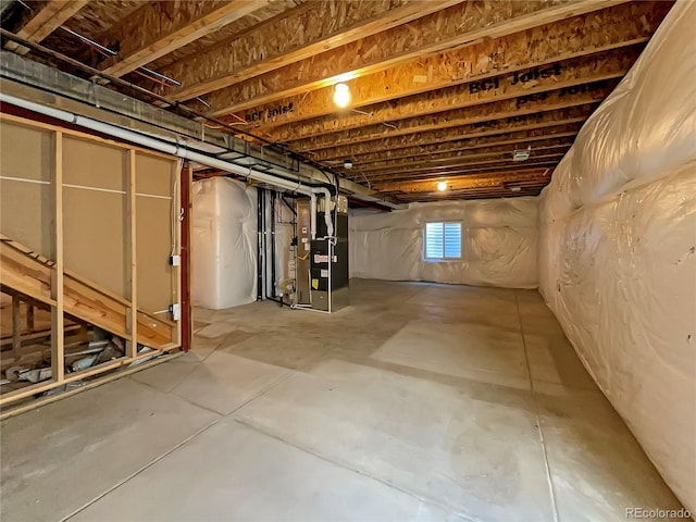 basement featuring heating unit