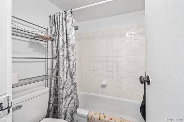 9700 E Iliff Ave Unit E51, Denver, CO 80231 - bathroom with toilet and shower / tub combo with curtain