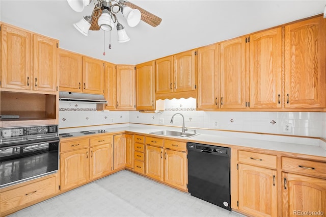 kitchen with sink, decorative backsplash, black appliances, and ceiling fan