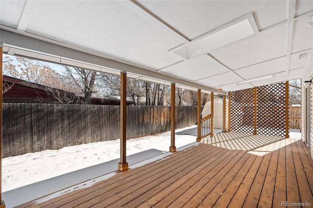 view of snow covered deck