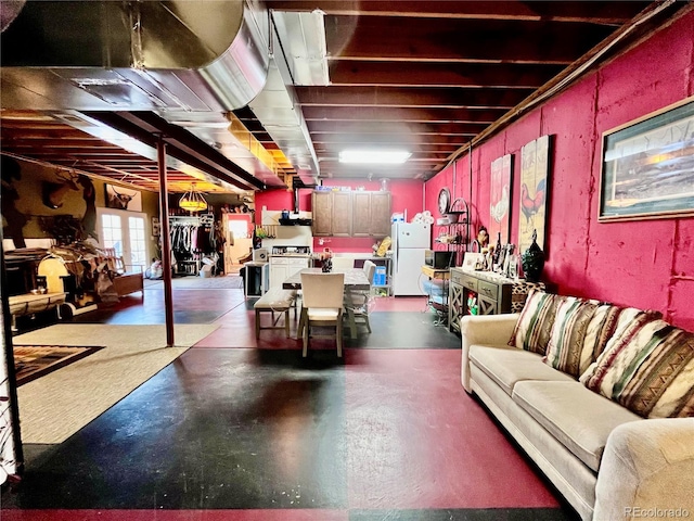 basement with white fridge