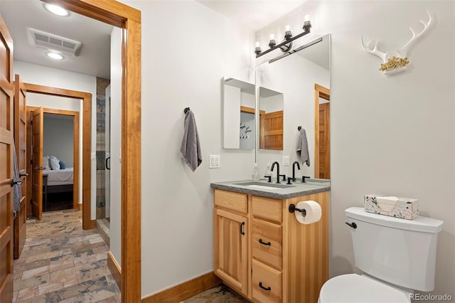 504 Ravenwood Dr Unit B2, Grand Lake, CO 80447 - full bathroom featuring vanity, toilet, ensuite bathroom, and baseboards