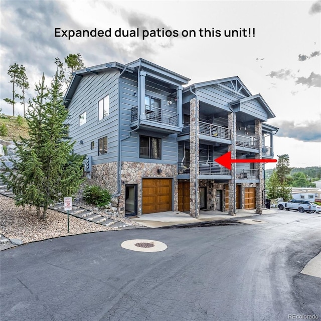 504 Ravenwood Dr Unit B2, Grand Lake, CO 80447 - view of building exterior with an attached garage