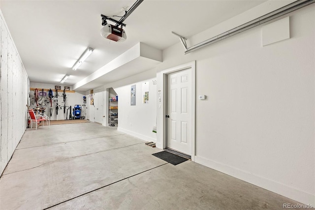 504 Ravenwood Dr Unit B2, Grand Lake, CO 80447 - garage with a garage door opener and baseboards