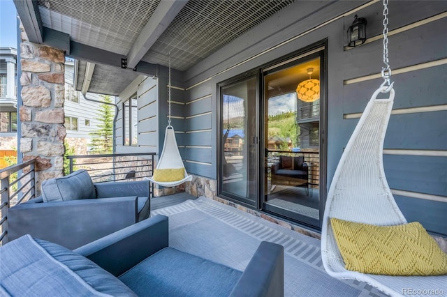 504 Ravenwood Dr Unit B2, Grand Lake, CO 80447 - view of exterior entry with stone siding and covered porch