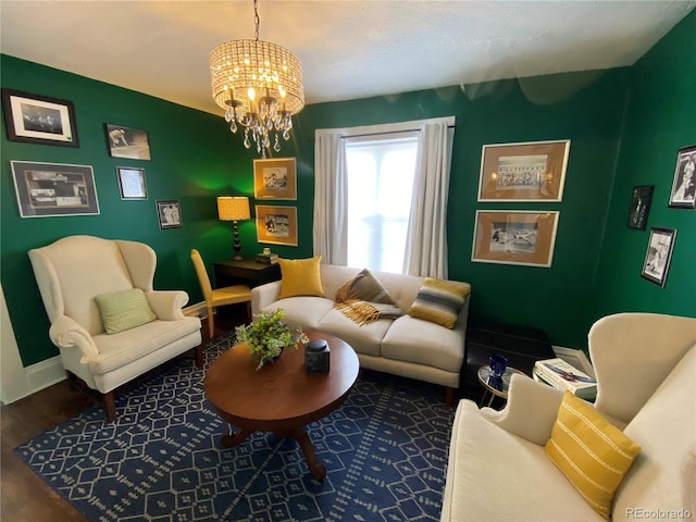 interior space with a chandelier, baseboards, and wood finished floors