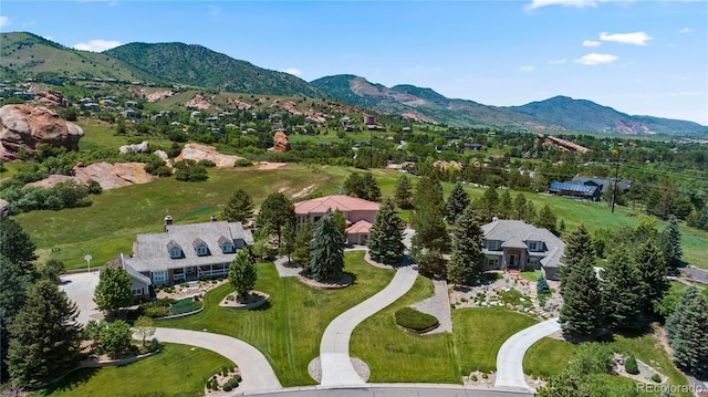 69 N Ranch Rd, Littleton, CO 80127 - aerial perspective of suburban area featuring a mountainous background