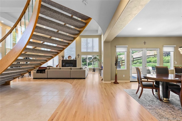 69 N Ranch Rd, Littleton, CO 80127 - living room with light wood-style floors, baseboards, recessed lighting, and stairs