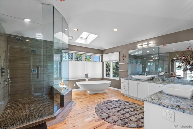 69 N Ranch Rd, Littleton, CO 80127 - full bathroom with vanity, a shower stall, wood finished floors, and recessed lighting