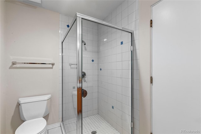 69 N Ranch Rd, Littleton, CO 80127 - bathroom featuring toilet and a shower stall