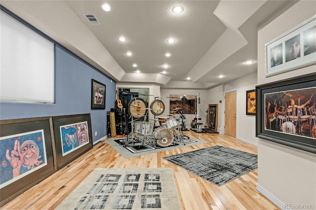 69 N Ranch Rd, Littleton, CO 80127 - exercise room with wood finished floors, baseboards, a tray ceiling, and recessed lighting