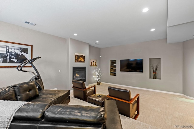 69 N Ranch Rd, Littleton, CO 80127 - living area with a glass covered fireplace, carpet floors, recessed lighting, and baseboards