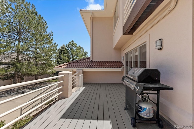 69 N Ranch Rd, Littleton, CO 80127 - wooden deck featuring a grill