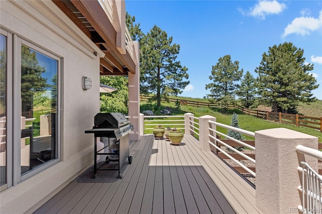 69 N Ranch Rd, Littleton, CO 80127 - wooden deck featuring a grill and a view of countryside
