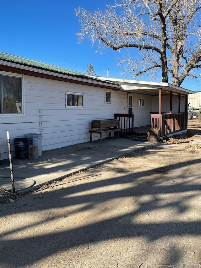 rear view of house featuring a patio