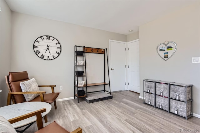 living area featuring light hardwood / wood-style floors