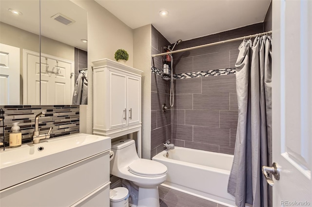 full bathroom featuring vanity, toilet, shower / tub combo, and decorative backsplash