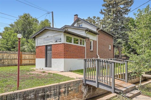 3655 Zenobia St, Denver, CO 80212 - view of home's exterior with brick siding and a chimney