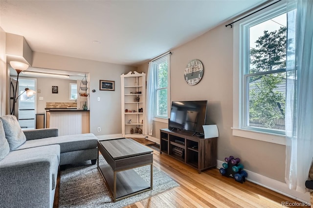 3655 Zenobia St, Denver, CO 80212 - living room with light wood-style floors and baseboards
