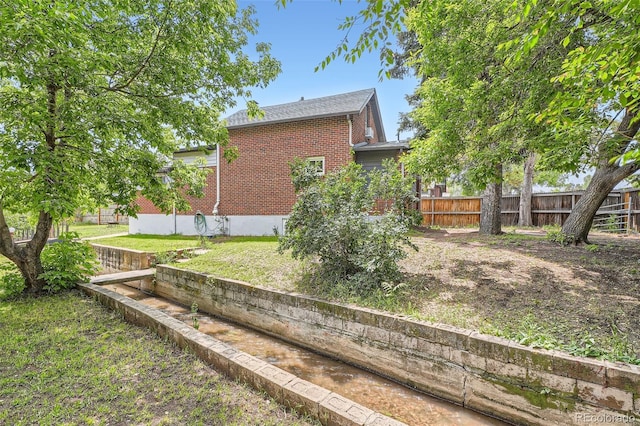 3655 Zenobia St, Denver, CO 80212 - back of house with brick siding