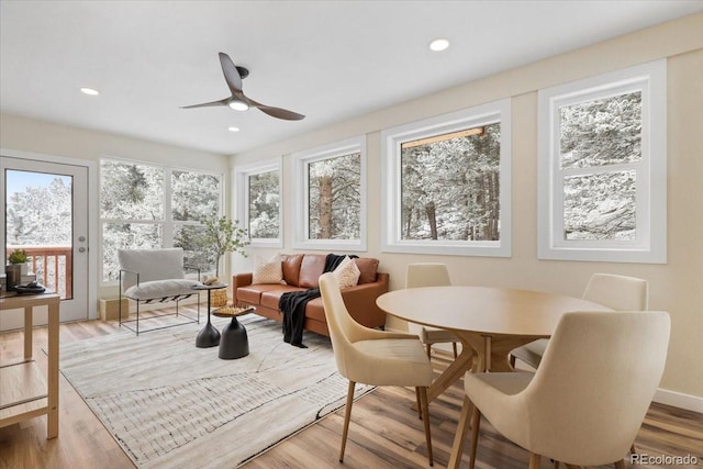 sunroom / solarium with ceiling fan