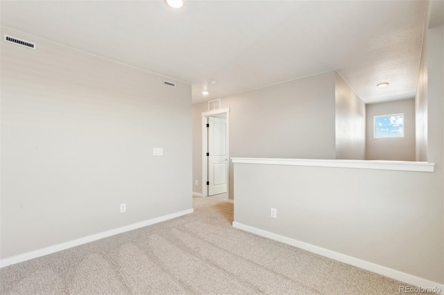 17943 E 94th Pl, Commerce City, CO 80022 - carpeted empty room featuring baseboards and recessed lighting