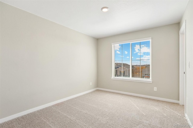 17943 E 94th Pl, Commerce City, CO 80022 - empty room featuring light colored carpet