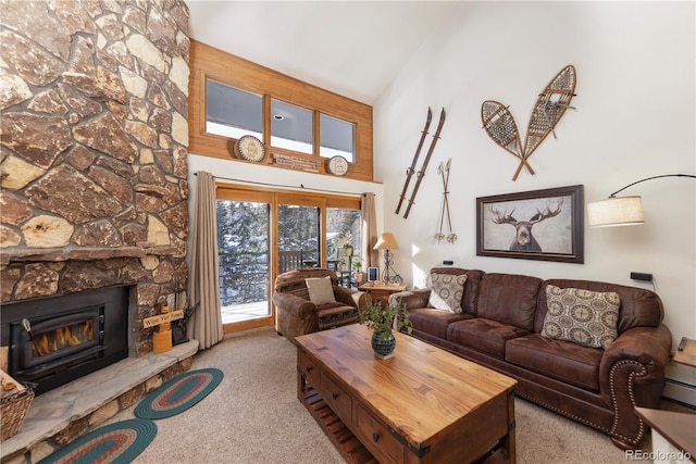 living room featuring carpet, a towering ceiling, and a fireplace