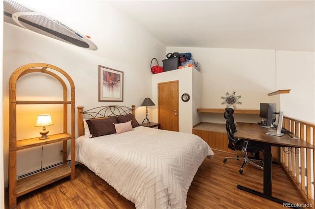 bedroom with wood finished floors