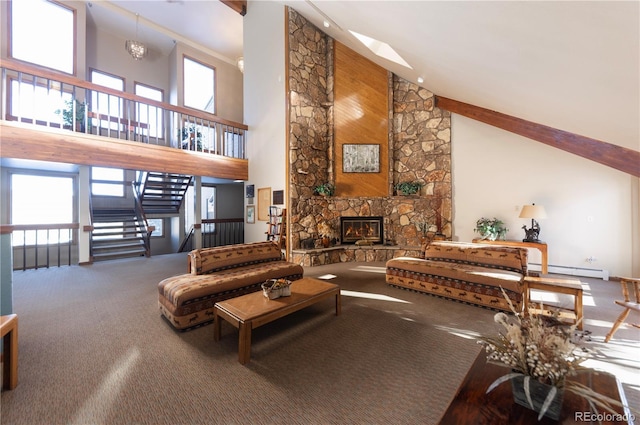 living area featuring a baseboard heating unit, stairs, carpet flooring, a stone fireplace, and high vaulted ceiling