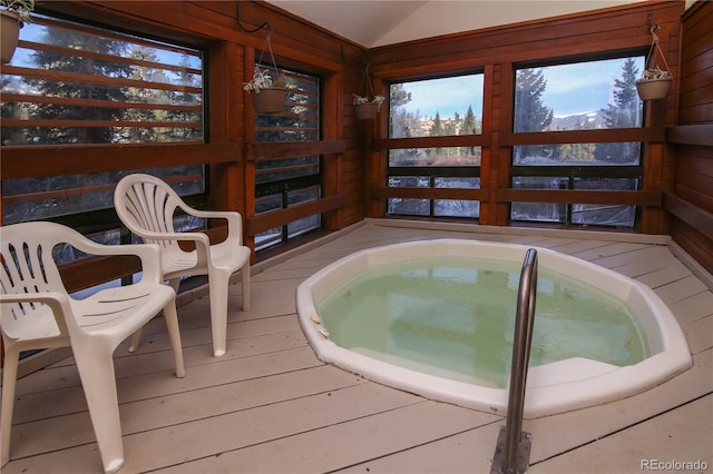 interior space with an indoor in ground hot tub