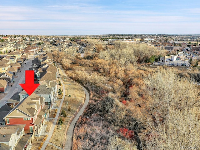 birds eye view of property with a residential view