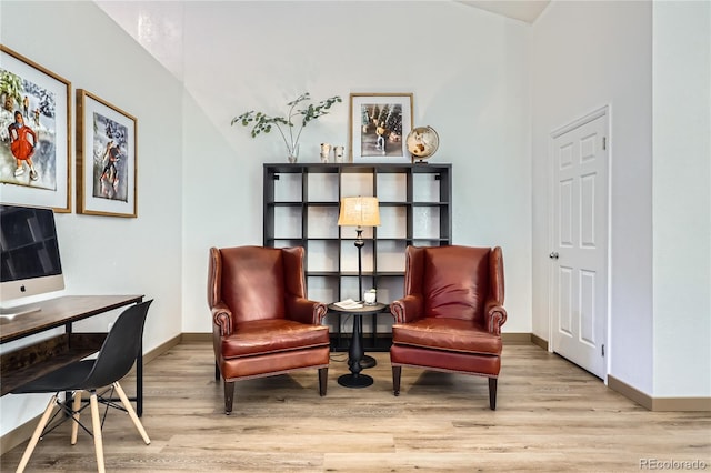 sitting room featuring wood finished floors and baseboards