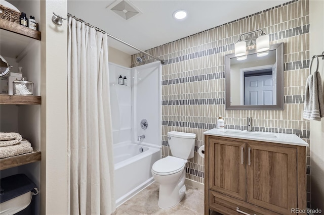 full bathroom featuring tile patterned flooring, tile walls, toilet, and shower / bath combo