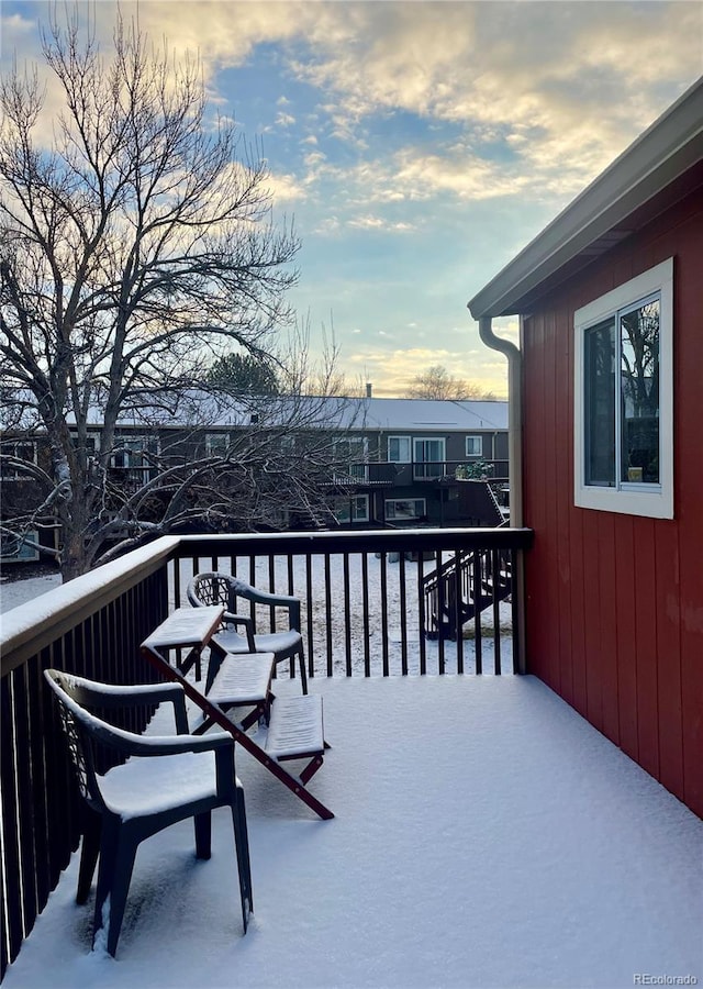 view of snow covered deck