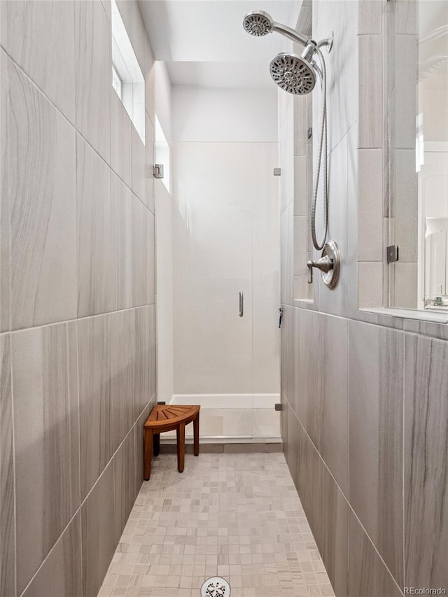 6970 E Lake Dr, Centennial, CO 80111 - full bathroom with a tile shower