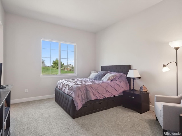 6970 E Lake Dr, Centennial, CO 80111 - carpeted bedroom featuring baseboards