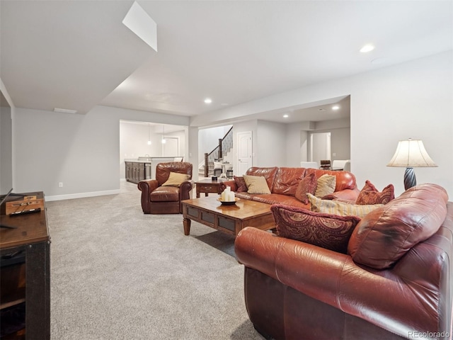 6970 E Lake Dr, Centennial, CO 80111 - carpeted living area with recessed lighting, baseboards, and stairway