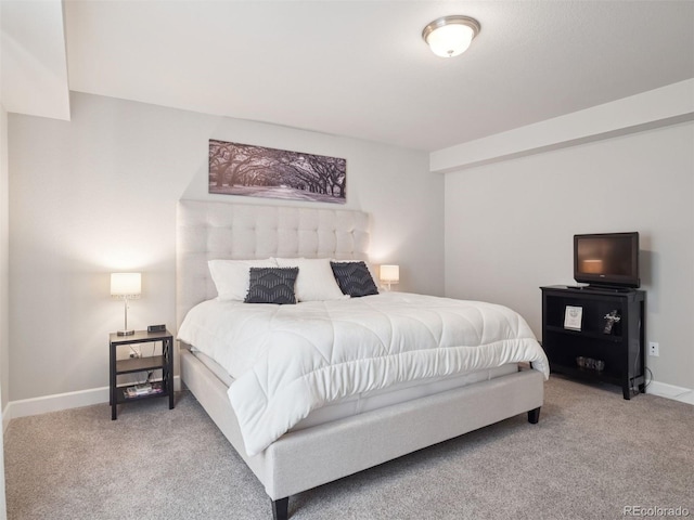 6970 E Lake Dr, Centennial, CO 80111 - carpeted bedroom featuring baseboards