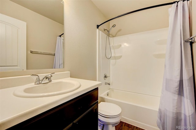 full bathroom with shower / bathtub combination with curtain, vanity, toilet, and wood-type flooring