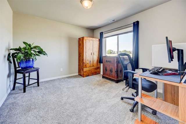 home office featuring light colored carpet