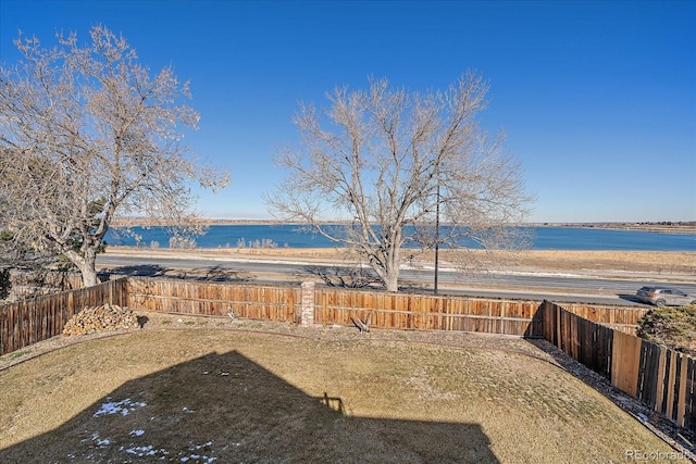 view of yard with a water view