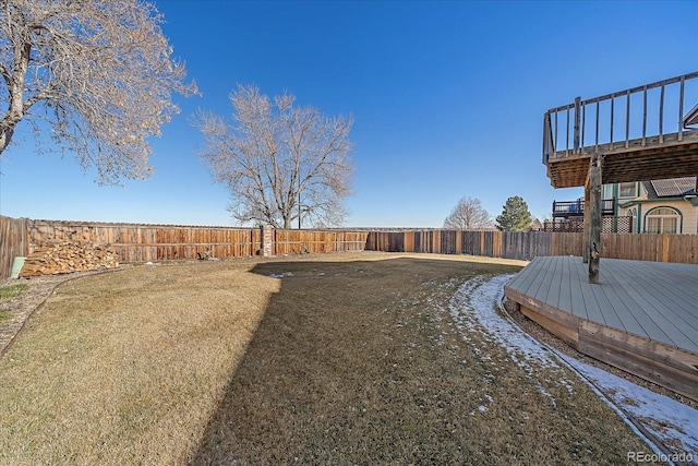 view of yard featuring a wooden deck