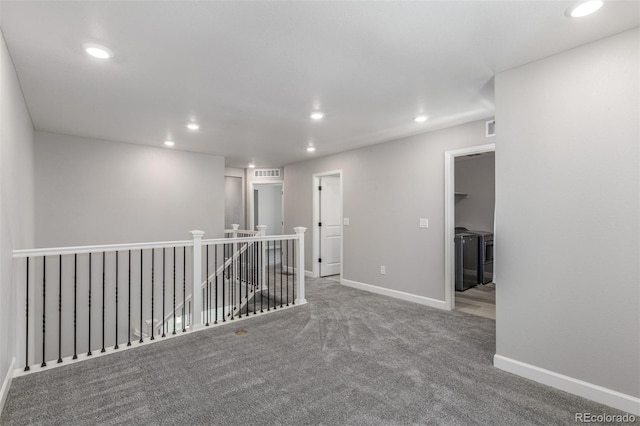 3338 Ireland Moss St, Castle Rock, CO 80109 - spare room with washer and dryer, recessed lighting, and carpet
